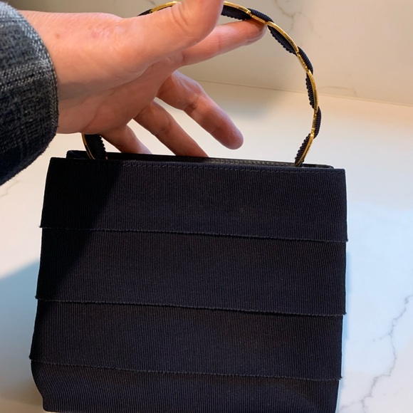 Navy blue Ferragamo fabric bag with beautiful gold signature handle. - Picture 2 of 14